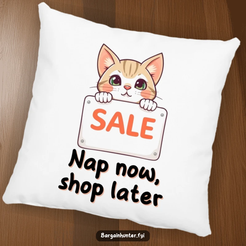 Funny cat peeking from behind a sale sign on a pillow, decorative cushion adding humor and feline charm to cozy spaces.
