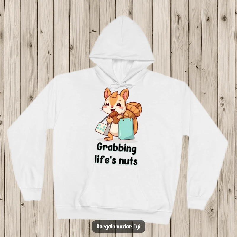Funny, kawaii squirrel with a shopping bag, excitedly grabbing an oversized acorn, designed on a warm and cozy hoodie, great for humor.