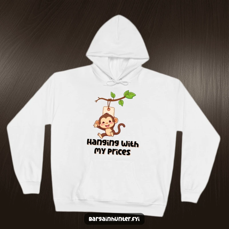 Funny monkey character swinging from a price tag like a vine on a cozy hoodie.